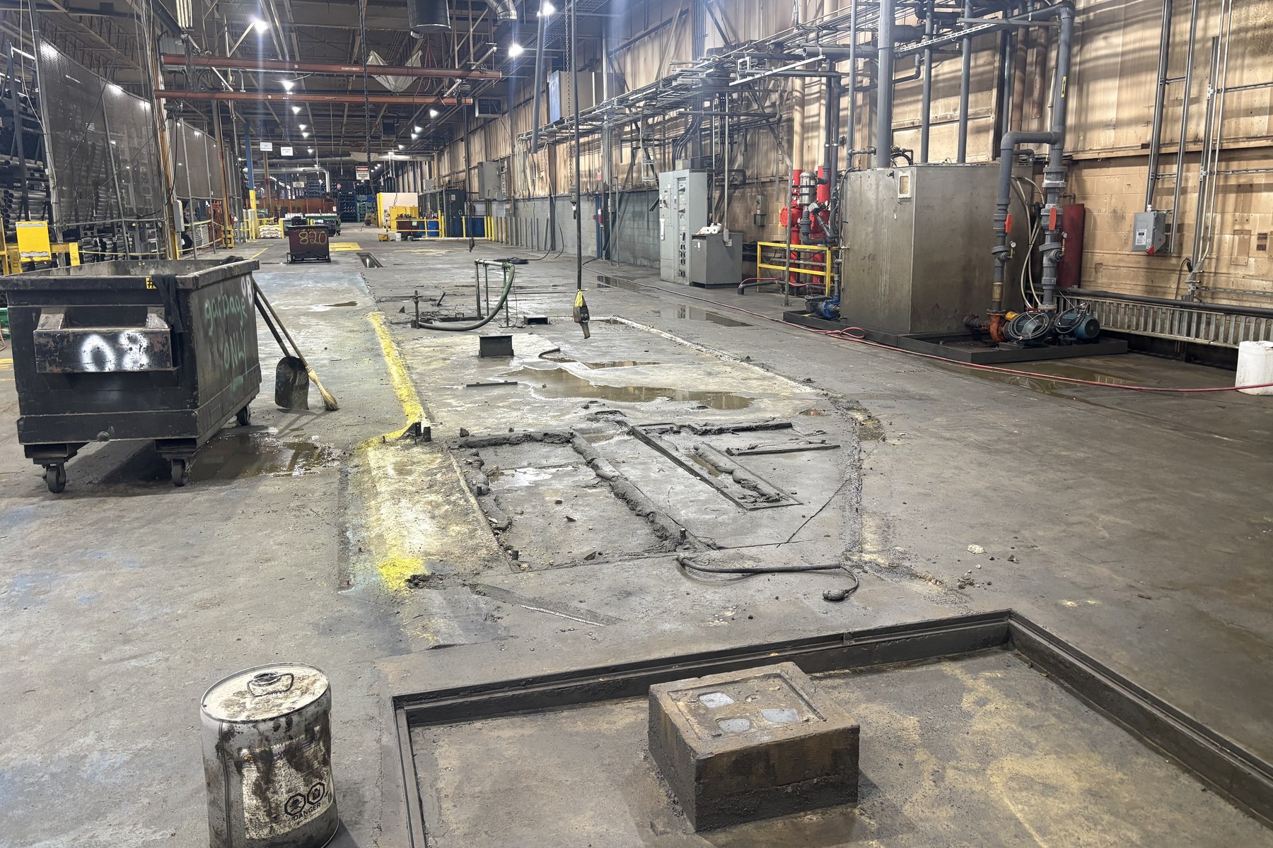 Prepared slab area with embedded steel where plant equipment was removed
