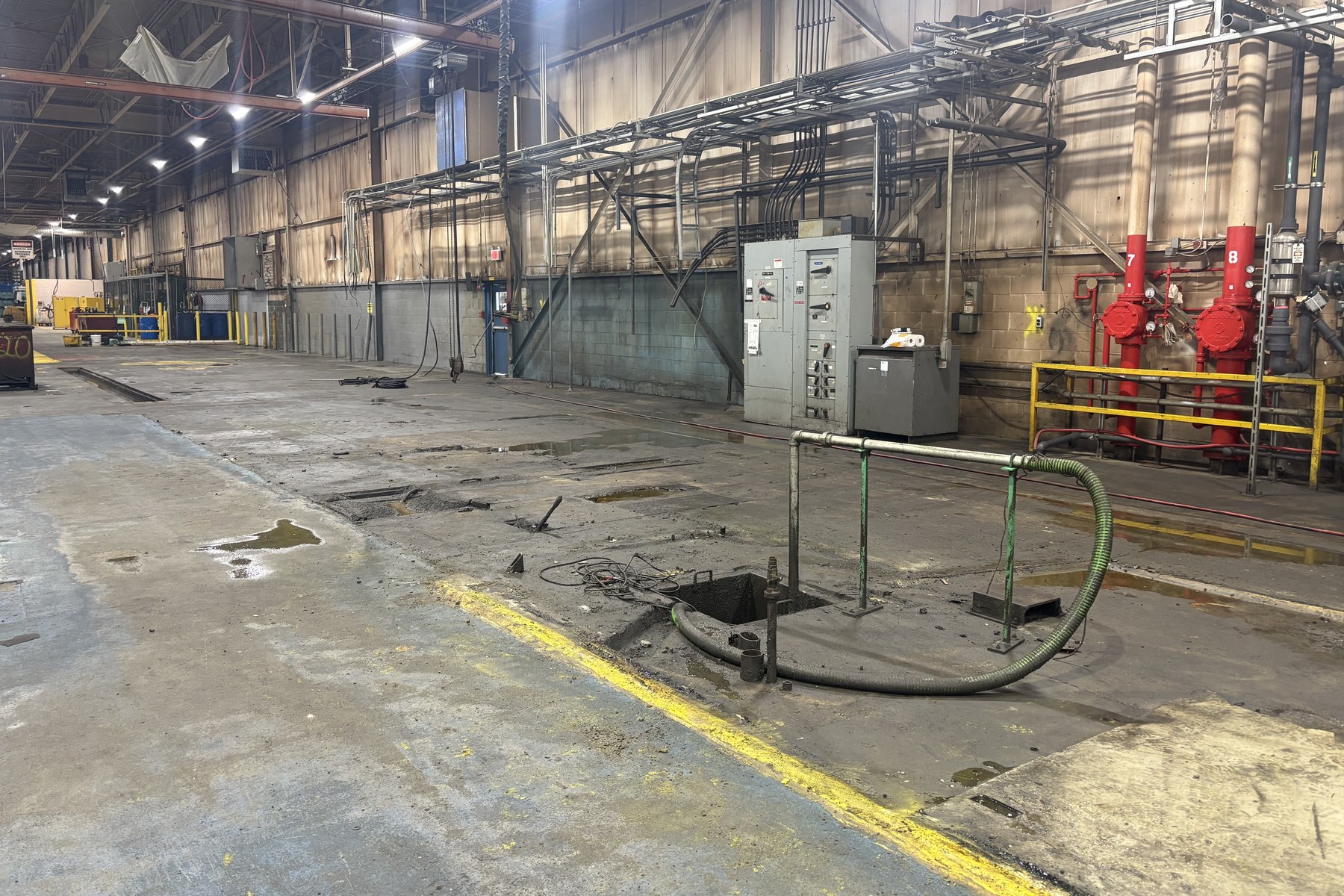 New concrete alongside plant electrical and fire protection services