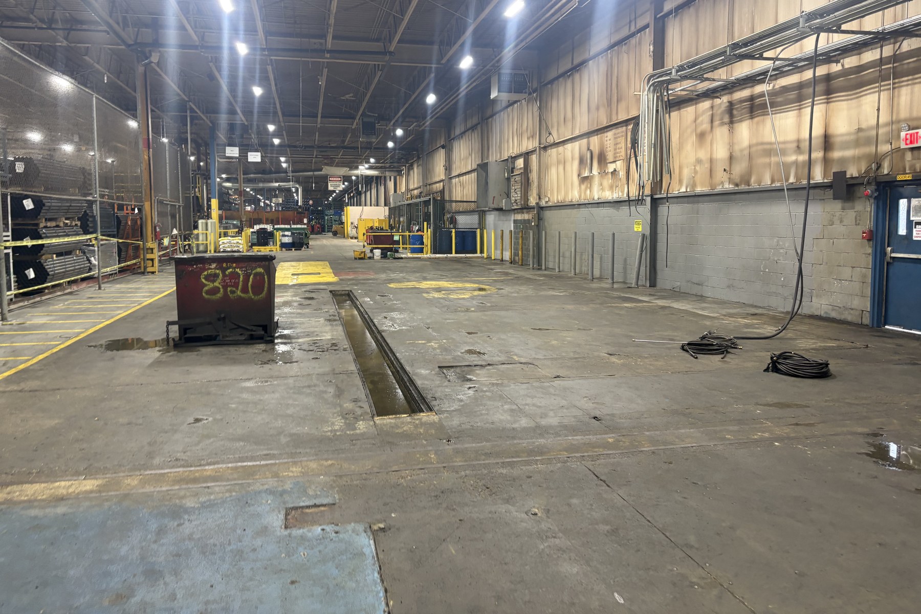 Plant floor and service trench following equipment removal